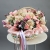 Композиция в корзине "Диодора" из французских роз Квиксенд, диантусов и кустовых пионовидных роз Бомбастик в Балашихе